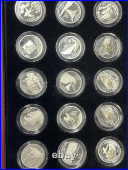 1999-2008 US Mint Silver Proof quarter 50 coin set in wooden box. Sweet