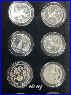 1999-2008 US Mint Silver Proof quarter 50 coin set in wooden box. Sweet